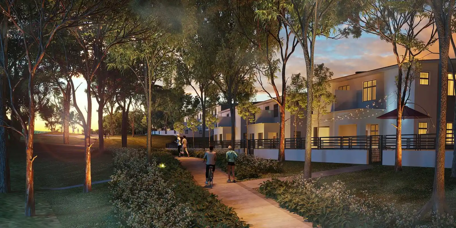 Golden hour path lined with mature trees leading to Raintree Residences semi-detached homes, residents walking and cycling